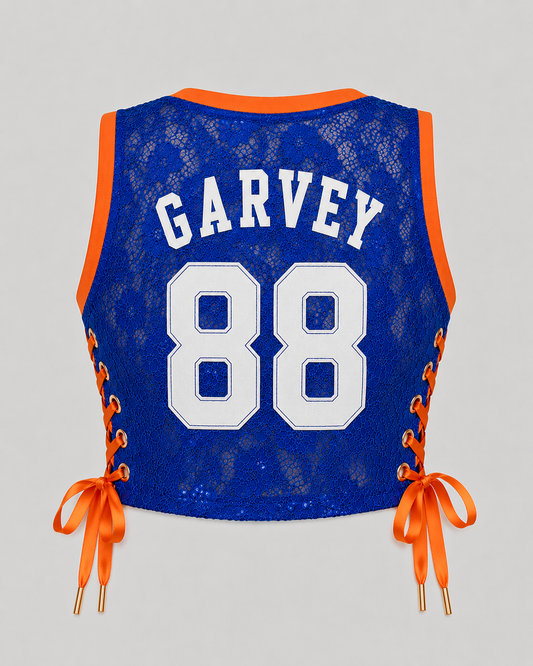 GARVEY royal blue lace cropped basketball jersey featuring white GARVEY nameplate and white number 88 with orange rib trim and satin lace-up sides.