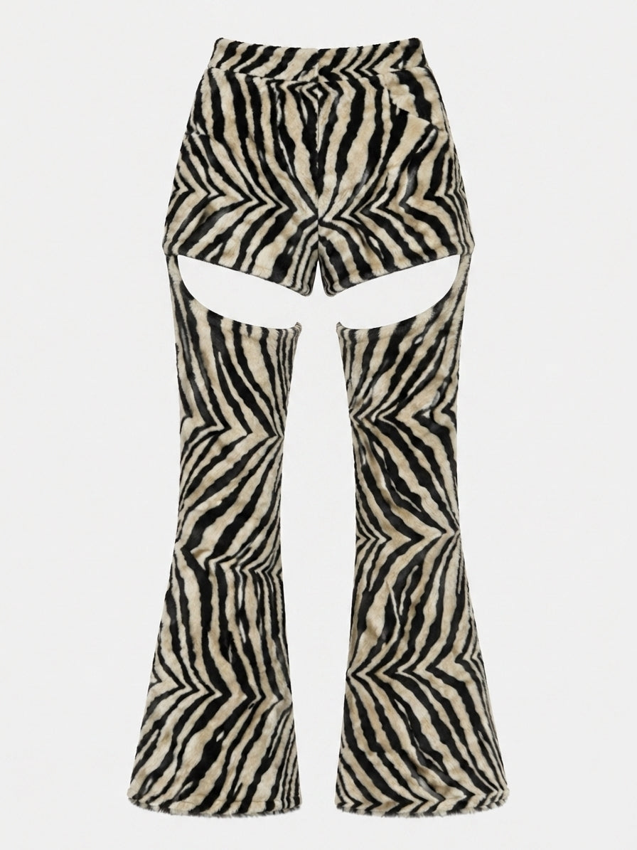 Zebra-print flared pants with large cutout details at the upper thighs, shown against a plain light gray background.