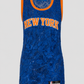 Blue basketball jersey with 'New York' text on a gray background