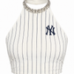 A white halter crop top with navy blue pinstripes, featuring a navy blue New York Yankees logo on the left chest and a sparkling rhinestone embellished collar.