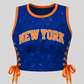 GARVEY New York royal blue floral lace cropped basketball jersey with orange rib trim and satin corset side lacing.