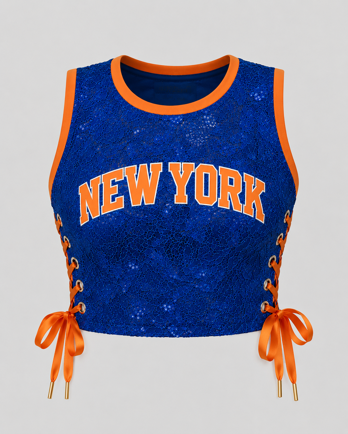 GARVEY New York royal blue floral lace cropped basketball jersey with orange rib trim and satin corset side lacing.